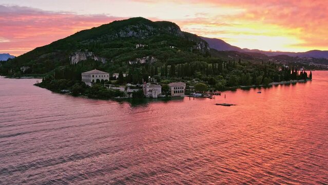 A beautiful sunrise on Italy's Lago di Garda. Punta San Vigilio at sunrise. 