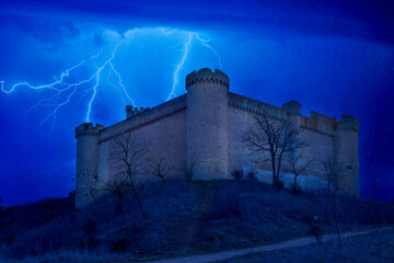 medieval castle at night with storm