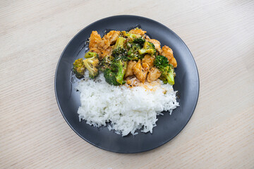 Chicken and broccoli stir fry with steam rice.