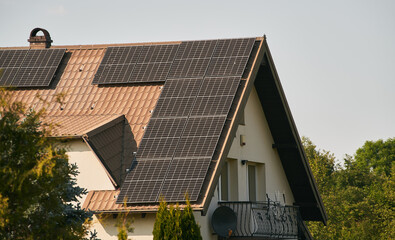 Sustainable Modern House with Solar Panels. A Beautiful Blend of Style and Renewable Energy. Sustainable home powered by solar panels.