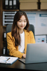 Business women working in the work area with laptop and tablet at the desk. business concepts.