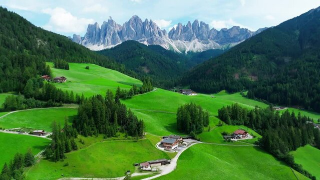 Santa Maddalena village and The Dolomites mountains in background, Val di Funes valley, Trentino Alto Adige region, Italy, Europe.