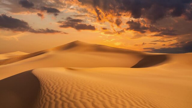 Timelapse of sunset over the sand dunes in the desert. Sahara desert