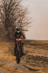 Fototapeta na wymiar motocross rider on the road