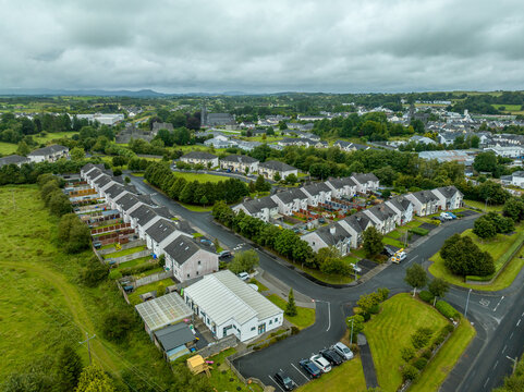 Aerial top down view of triplex and duplex house residential real estate community in Ireland in a cul-de-sac