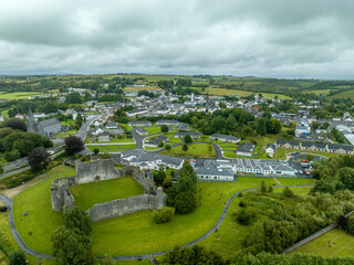 Aerial view of Ballymote town with  new real estate development neighborhood surrounding the medieval castle ruin