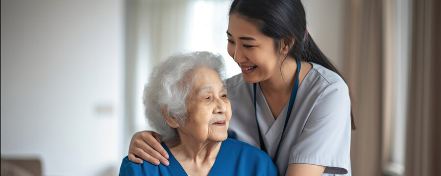 Caregiver assisting senior woman at home