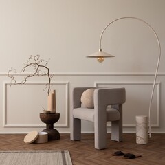 Creative composition of living room interior with copy space, modern armchair, round pillow, lamp, wooden coffee table, pouf, gray rug, vase with branch and personal accessories. Home decor. Template.