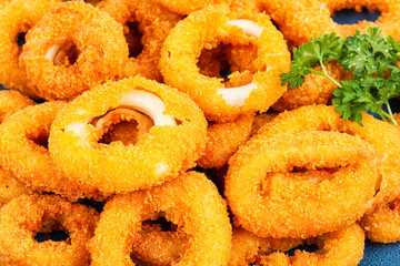 Deep fried squid rings, close up.