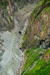 dried up riverbed, mountain stream in gorge. vertical image. beautiful mountain landscape