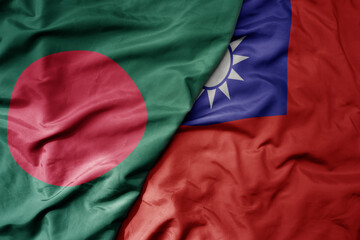 Fototapeta premium big waving realistic national colorful flag of bangladesh and national flag of taiwan .