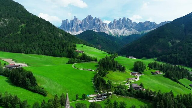 Santa Maddalena village and The Dolomites mountains in background, Val di Funes valley, Trentino Alto Adige region, Italy, Europe.