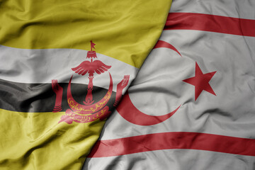 big waving realistic national colorful flag of brunei and national flag of northern cyprus .