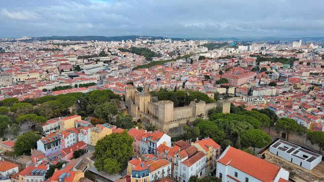 Lisbon: Aerial view of capital city of Portugal, Sao Jorge Castle (Castelo de S&atilde;o Jorge), sunny summer day - landscape panorama of Europe from above