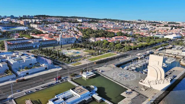 Lisbon: Aerial view of capital city of Portugal, Jeronimos Monastery (Mosteiro dos Jer&oacute;nimos) + Praca do Imperio Garden (Jardim da Pra&ccedil;a do Imp&eacute;rio) - landscape panorama of Europe from above