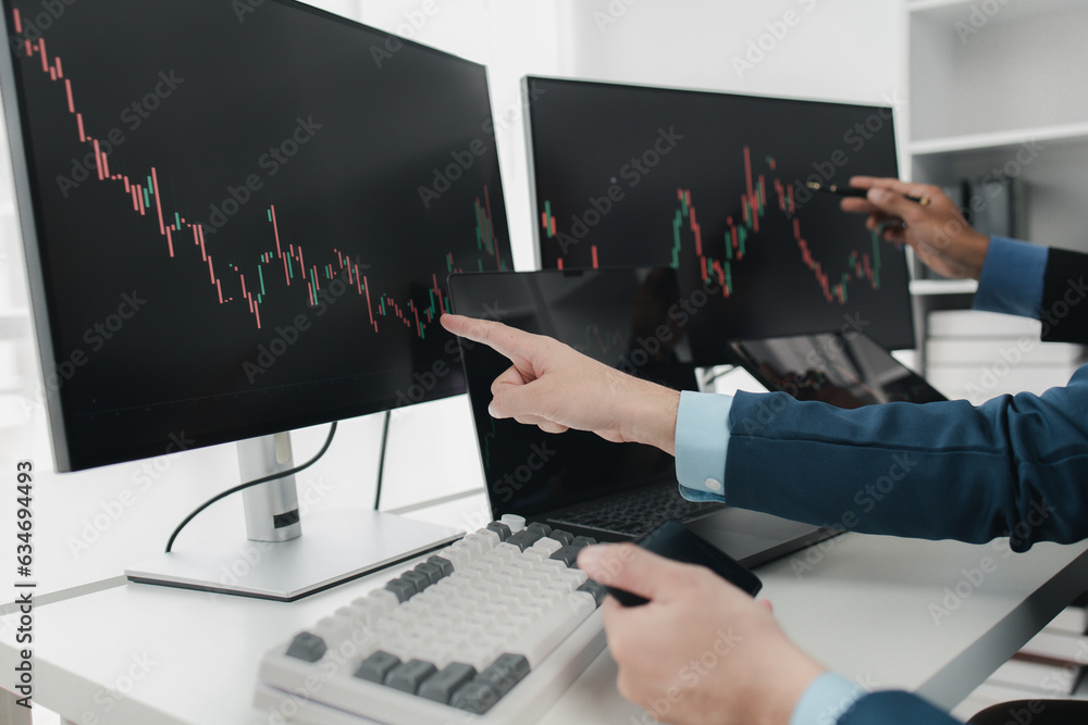 Wall mural Two stock investors with stock market graph screen, stock fluctuation analysis, business man trading stocks for profit, stock market fluctuation graph screen, profit trading analysis.