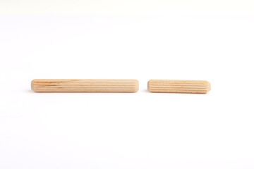 Versatile wooden dowel for easy furniture assembly.