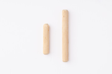 Versatile wooden dowel for easy furniture assembly.