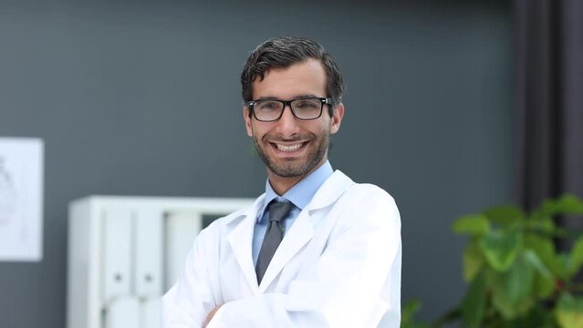 Confident male doctor in a research center close-up