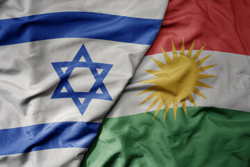 big waving realistic national colorful flag of israel and national flag of kurdistan .