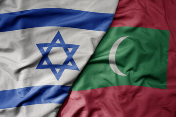 big waving realistic national colorful flag of israel and national flag of maldives .