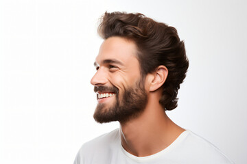 Obraz premium A close-up portrait of an attractive man showcasing a bright smile with pristine teeth, utilized for a dental advertisement. The individual features a modern, stylish haircut and beard Generative AI