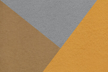 Texture of craft gray, brown and ocher shade color paper background, macro. Structure of vintage...