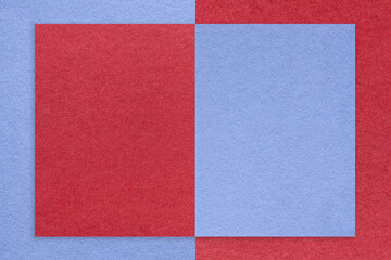 Texture of red and blue paper background with geometric shape and pattern, macro. Structure of craft cardboard