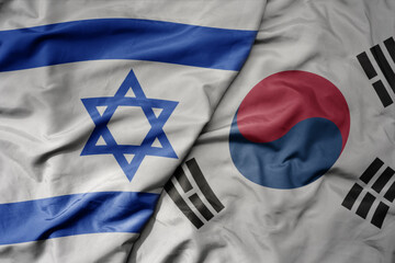 big waving realistic national colorful flag of israel and national flag of south korea .