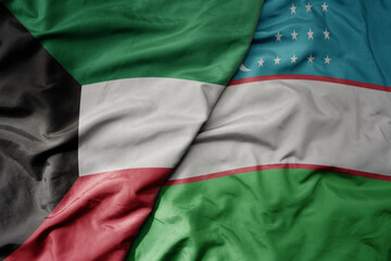 big waving realistic national colorful flag of kuwait and national flag of uzbekistan .