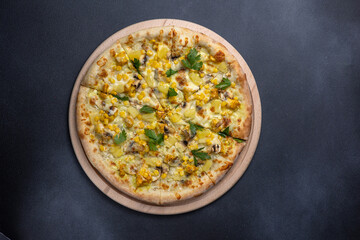 Italian cuisine. Delicious pizza on a dark background