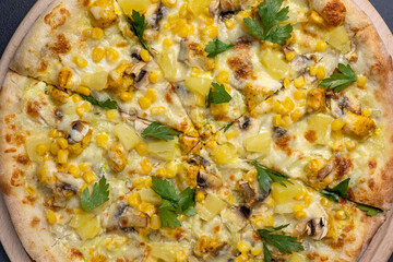 Italian cuisine. Delicious pizza on a dark background