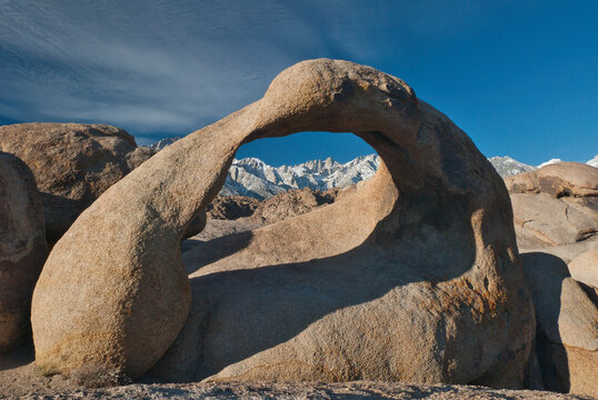 Lone Pine, California, United States –The Mobius Arch, a natural stone arch in the Alabama Hills, with Mt. Whitney and the Eastern Sierras in the background.