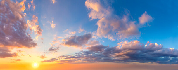 Ave real sky - Gentle colors Panoramic Sunrise Sundown Sanset Sky with colorful clouds. Without any birds. Large panoramic sky with sun.