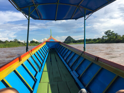 Colorful Long Boat on the River