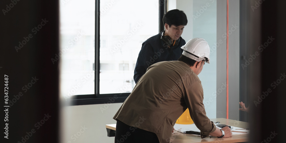 Poster young architect and engineer colleague workers working discussion, meeting and analyzing blueprint a