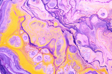 Exclusive beautiful pattern, abstract fluid art background. Flow of blending purple lilac yellow paints mixing together. Blots and streaks of ink texture for print and design