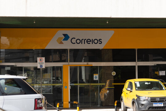 Salvador, Bahia, Brazil - August 11, 2023: Facade of the Post Office, written in Portuguese: Correios. On Avenida Tancredo Neves
