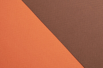 Rough kraft paper background, paper texture brown orange colors. Mockup with copy space for text.