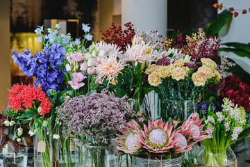 Bouquets of various flowers in floral shop
