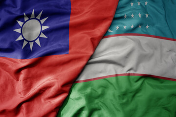big waving realistic national colorful flag of taiwan and national flag of uzbekistan .