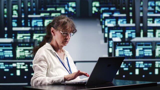 Capable repairman in cloud computing business equipped to handle complex computational operations, doing regular upgrades to supercomputers, increasing processing power to prevent perils