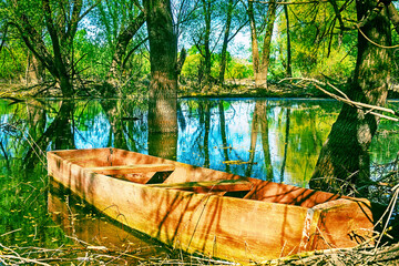 Old simple wooden one oar flat-bottomed boat design for inland waters. It resembles coffin and in...