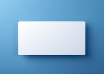 white sheet of paper on an blue wall