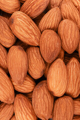 Almonds close up. Macro photo. Food pattern