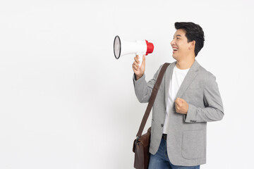 Young Asian businessman shout loudly and holding megaphone isolated on white background, Speaker...