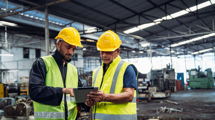 Mechanical technicians are maintaining the engine. Engineer checking Material or Machine on Plant. Workers Factory check up machine at factory site.