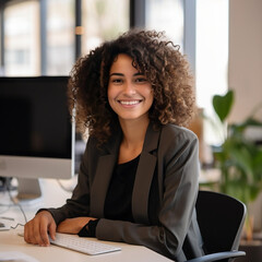 Young female secretary smiling in the office during work
