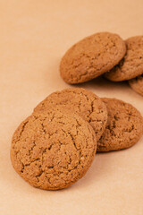 Oatmeal cookies on beige background.