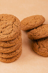 Stack of cookies. Oatmeal cookies on beige background.